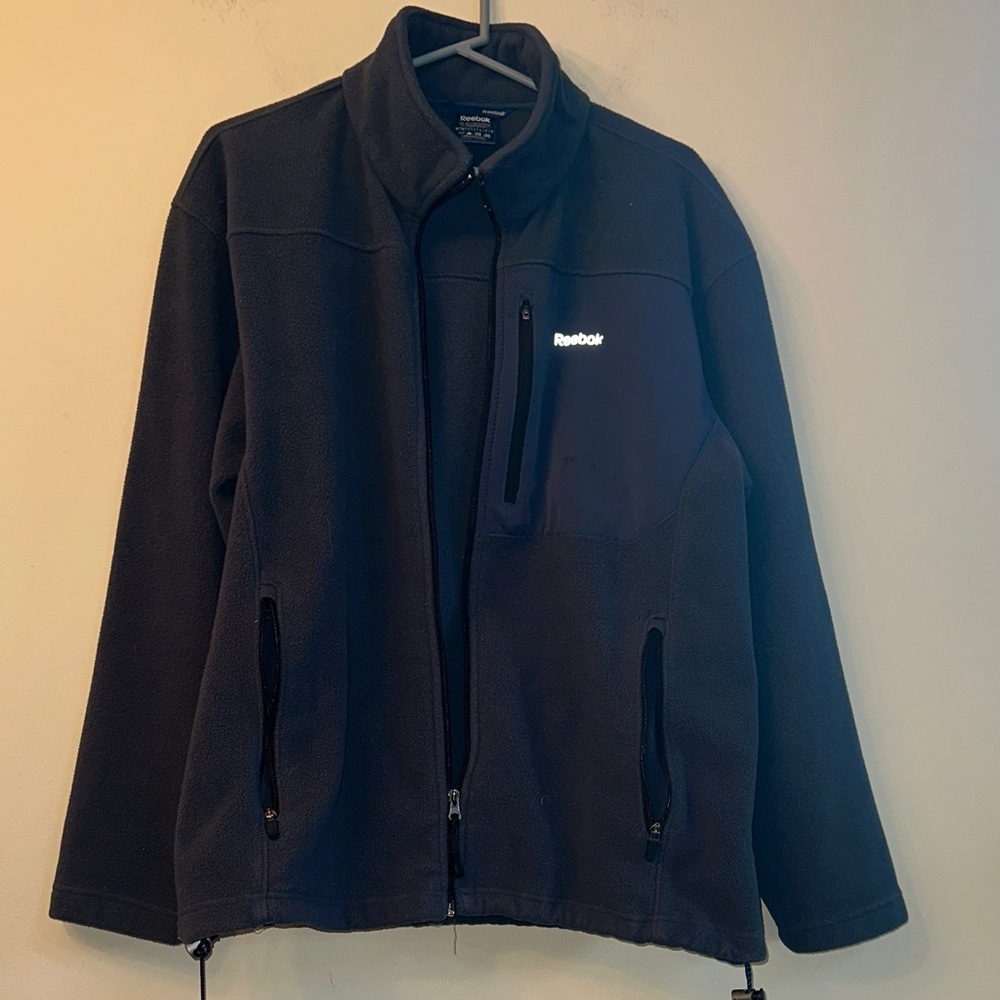 Reebok Men’s Fleece Jacket – 3 Zip Pockets – Nylon Trim – Fair/Good Condition